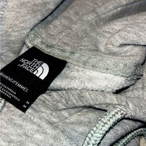 grey northface hoodie (ab a month old , size M)